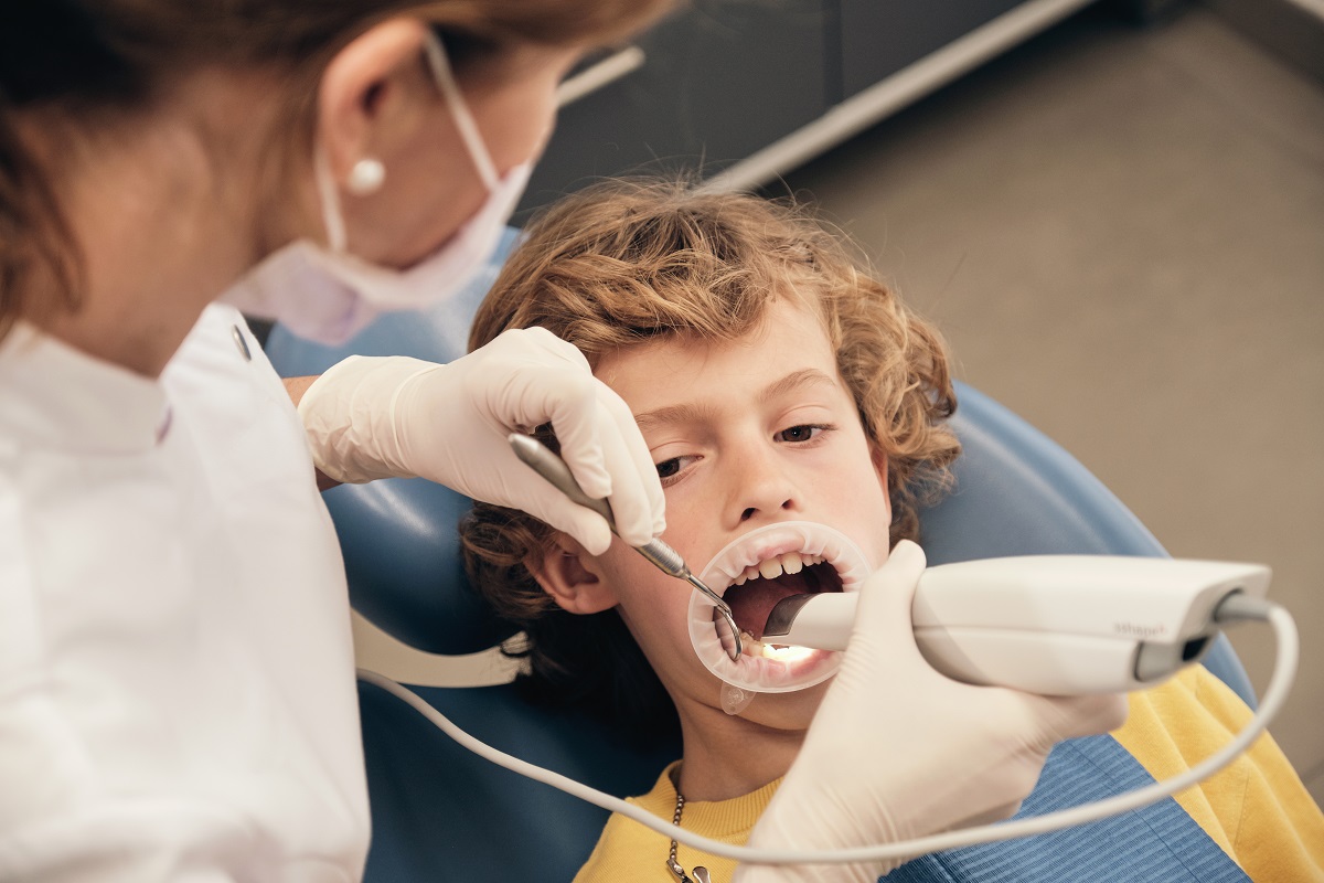 Can a tooth infection make my child sick